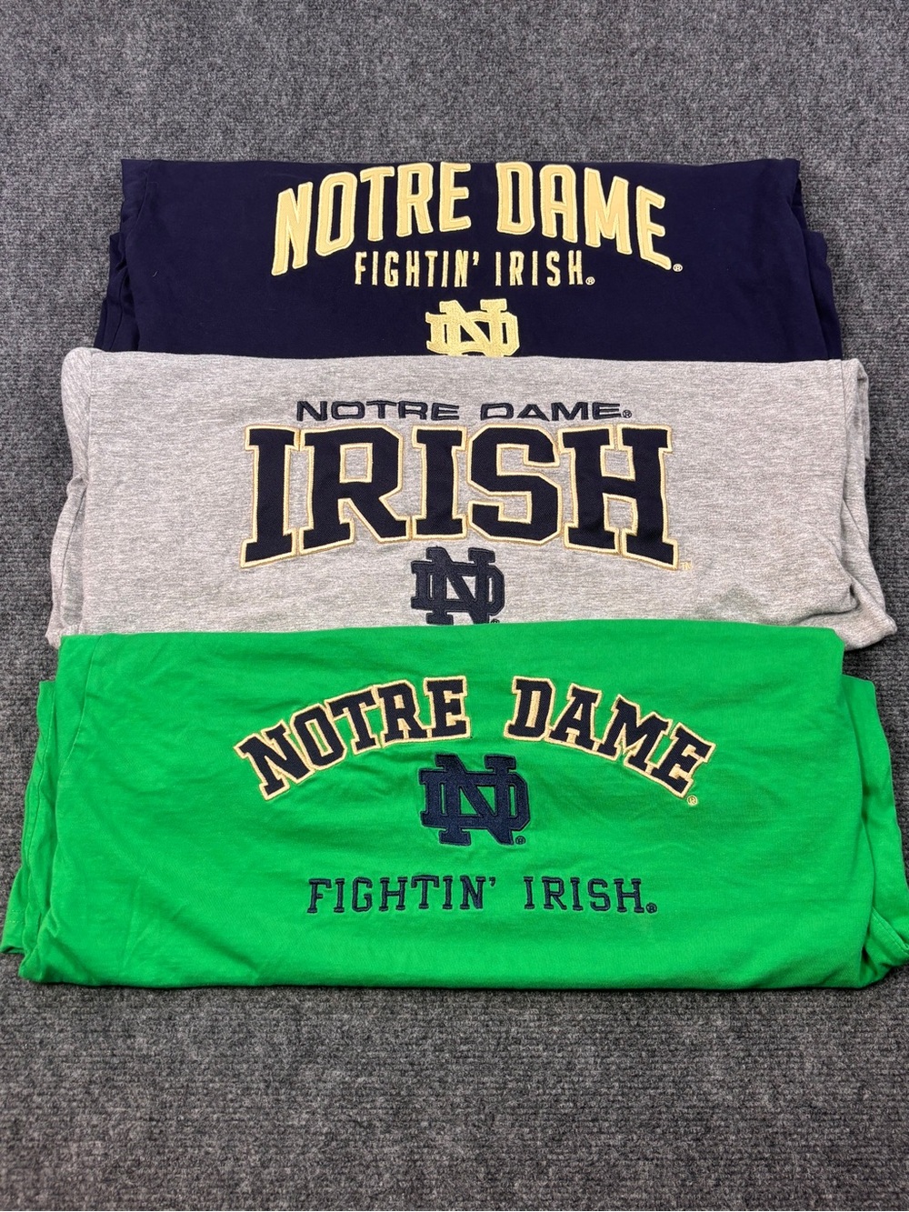3 Notre Dame embroidered tee shirts size large.